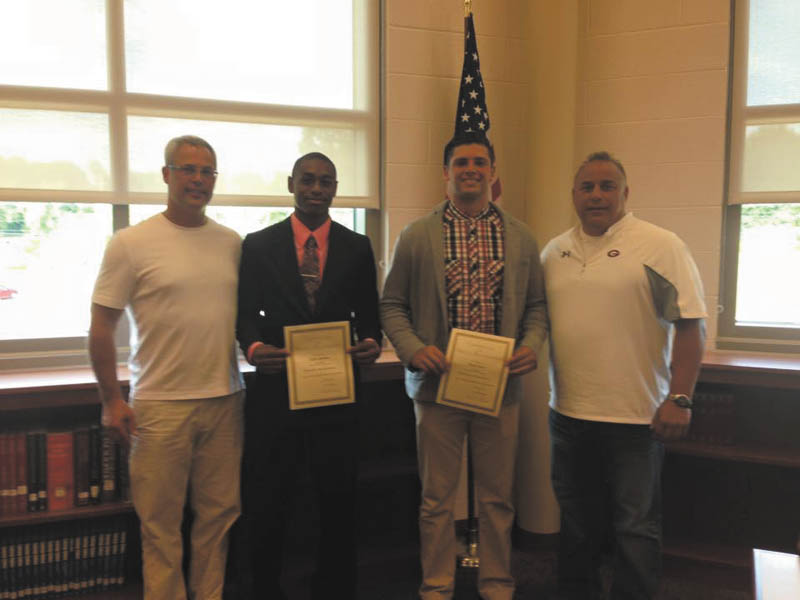 SPECIAL TO THE VINDICATOR
Colin Hardin and Jacob Ryser, who attended Buckeye Boys State, completed its leadership and citizenship challenges. They were recently recognized by Girard High School Principal William Ryser and city schools Superintendent David Cappuzzello. Girard American Legion sponsors students for Boys State. Above from left are William Ryser, Hardin, Jacob Ryser and Cappuzzello.