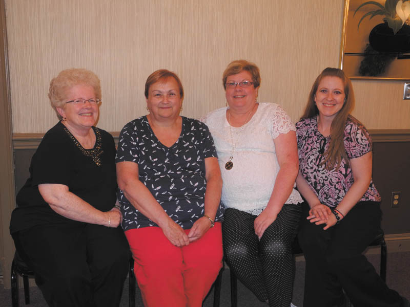 SPECIAL TO THE VINDICATOR
At a recent meeting of the Mill Creek Chapter of the American Business Women’s Association, new officers began a one-year term through July 2016. From left are Judy Codespote of Canfield and Shirley Pappagallo of Austintown, both returning as chapter president and vice president respectively; Mary Brown of Canfield, secretary; and Mandy Codespote of Canfield, treasurer. 
