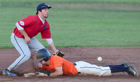 STRUTHERS, OHIO - JULY 31, 2015: Riley Campbell #6 of Youngstown Cene steals second base while second basemen Dom Castello #16 of Charters Valley bobbles the ball in the 1st inning during Friday nights PONY tournament game at Cene Park. DAVID DERMER | THE VINDICATOR