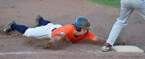 STRUTHERS, OHIO - JULY 31, 2015: Riley Campbell #6 of Youngstown Cene slides head first to advance to third on a wild pitch in the 1st inning during Friday nights PONY tournament game at Cene Park. DAVID DERMER | THE VINDICATOR