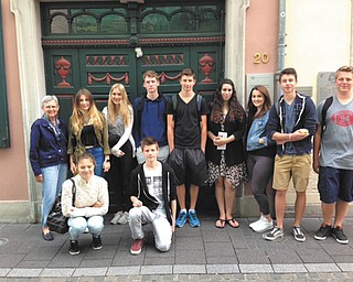 SPECIAL TO THE VINDICATOR
Students from Boardman and Fitch high schools, accompanied by Sieglinde and Larry Warren, exchange coordinators, visited Hennef, Germany, where they stayed in the homes of students they had hosted in the fall. The local students and their German hosts visited Beethoven’s home in Bonn, climbed the 533 Cologne Cathedral steps for a view of the city and visited the home of Anne Frank in Amsterdam, the Netherlands. This was the 10th year the exchange has taken place with the Gesamtschule, a school in Hennef. German students and teachers will visit this area for the Thanksgiving holiday. In front of Beethoven’s birthplace, from left, kneeling, are Veronika Heyder and Tim Weinberg, and standing are Sieglinde Warren, Antonia Seelbach, Janika Schmidt, Mike Dina, Joel Johnel, Destiny Odom, Lisa Winterberg, Bastian Kraemer and Marius Messerschmidt.
