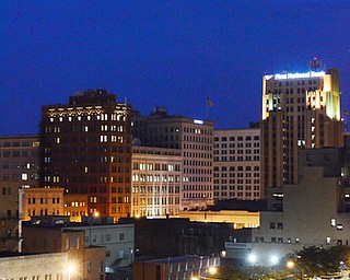 Katie Rickman | The Vindicator.Fred Morris, director of the Wyoming based band "Troopers" stands near band members as they run through drills at Fitch High School. The band practiced all day at Fitch High School at various locations on the campus.