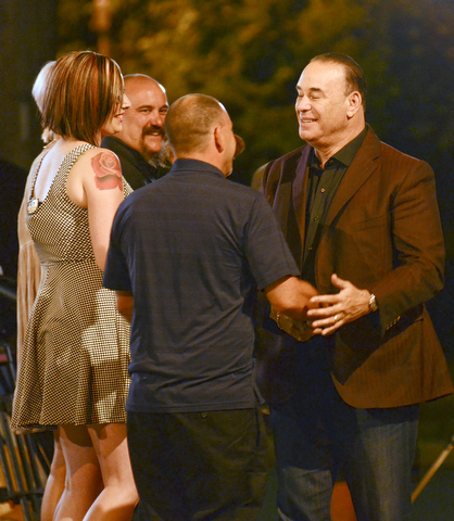 Jon Taffer, bar and nightlife management expert and star of SpikeTVÕsÒBar RescueÓ, speaks to the owners and bartenders of the Royal Oaks bar, 924 Oak St., when filming scenes for the unveiling of the barÕs makeover.