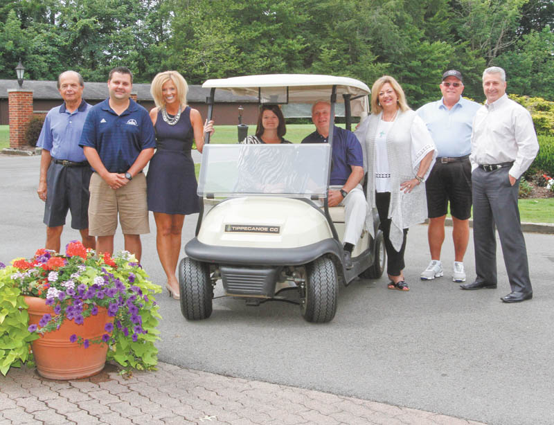 ROBERT K. YOSAY | THE VINDICATOR
The second Tippecanoe Golf Classic will take place Sept. 14 at Tippecanoe Country Club, 5870 Tippecanoe Road, Canfield, to benefit Hospice of the Valley. A donation of $125 per person for the scramble includes 18 holes of golf, lunch, dinner and prizes. Registration, driving range and lunch begin at 11 a.m. The shotgun start will be at noon. Cocktails will be at 5 p.m. followed by a buffet dinner. The dinner and festivities only will cost $40 per person. Sponsorships, hole sponsors and auction items are welcome. Honorary chairman for the event is Dr. Edward Novosel. Bob Ferraro, a member and past president of Tippecanoe Country Club, is the event chairman, and committee members are Liz McGarry, Leslie Coalmer, Nancy Sullivan, Louann Sutton-Kutlick, Paula Durkin and Andy Zabel. For a hole-in-one on No. 9 Pete Brittain of Columbiana Buick-Cadillac-Chevrolet will donate a Cadillac ATS, and for a hole-in-one on No. 5 Judy Rafoth, president, and Monica Rafoth, vice president of Adamas Jewelry and Gifts, will donate a $10,000 shopping spree at Adamas. Hospice of the Valley offers compassionate end-of-life care to those with terminal illnesses and offers support to their families. For information about the classic or hospice services call 330-788-1992, email Liz_McGarry@Mercy.com or visit www.hospiceofthevalley.com. Above from left are William Rafoth, Zabel, Sullivan, Durkin, Novosel, McGarry, Brittain and Ferraro.