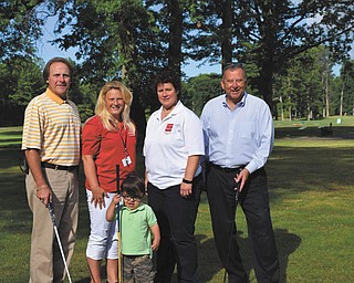 SPECIAL TO THE VINDICATOR
Some of those helping to make the Four Square Club Foundation’s annual Drive for Hearing a success are, in front, Jackson Diaz, 2015 child representative for Easter Seals and Youngstown Hearing and Speech; and in back, from left, Jeff Michalenok, chairman of the outing; Jodi Harmon, director of marketing and public relations for Easter Seals and Youngstown Hearing & Speech; Jennifer Roberts, special events coordinator for ES and YHS; and Mike Dercoli, ES and YHS development chairman and golf outing co-chairman.
