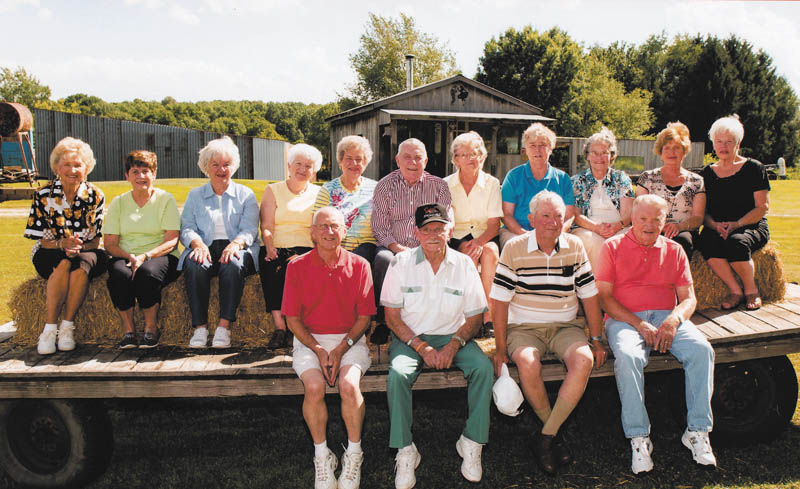 SPECIAL TO THE VINDICATOR
To celebrate its 60th class reunion, the Springfield High School Class of 1955 met at the home of Bob and Pat Wilson in Enon Valley, Pa., and went for a hayride. In front from left are Harold Allen, Don Paes, Roy Koch and Neil Moats. Sitting behind them are Millie (Bendik) Niece, Marion (Gebhardt) Hunt, Ruth (Lawrence) Withers, Carol (Dorrington) Massey, Sally (Goist) Cunningham, John Guffey, Pat (Kennedy) Wilson, Judy Valentine, Carolyn (Snyder) Barth, Norma (Lumley) Brown and Shirley (Smith) Drajic. Each class member received a book made by Paulette Roades, who was a teacher of theirs at the time of their graduation.