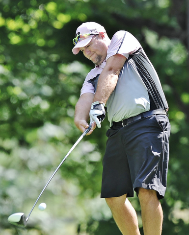 Tim Dye of Hermitage drives the ball down the fairway during Monday afternoon's Greatest Golfer of the Valley scramble held at the Lake Club in Poland.