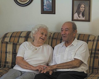 Louis Pizzuto, 89, and his wife, Dorothy, 88, of Liberty share a laugh as they reminisce over their past 70 years together. Married July 21, 1945, the couple say the foundation on which they’ve built their long-lasting marriage starts with good common sense. Crystal Belersdorfer | The Vindicator
