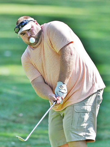 Jeff Lange | The Vindicator  AUGUST 21, 2015 - John Doughton III of Hubbard chips onto the green of hole 16 during the Greatest Golfer of the Valley tournament at Mill Creek Golf Course in Canfield, Friday, August 21st.