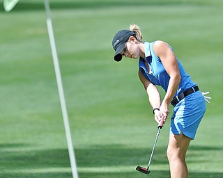 Katie Rogner of Youngstown watches her putt to the pin during Friday's Greatest Golfer of the Valley tournament at Mill Creek Golf Course.