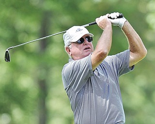 Jeff Lange | The Vindicator  AUGUST 21, 2015 - Tim Porter of Tippecanoe watches his shot from the tee during Friday's Greatest Golfer of the Valley tournament at Mill Creek Golf Course.