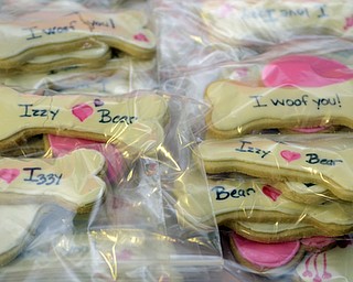 Katie Rickman | The Vindicator.Cookies with "Izzy loves Bear" and other messages were one of the many items available during the ceremony at The Learning Dog August 22, 2015.