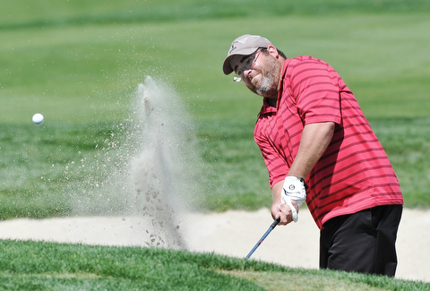Jeff Lange | The Vindicator  AUGUST 23, 2015 - Daniel Horace of Austintown attempts to hit his ball out of the No. 7 bunker during Sunday's Greatest Golfer of the Valley tournament held at the Lake Club.