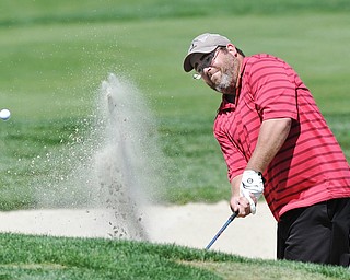 Jeff Lange | The Vindicator  AUGUST 23, 2015 - Daniel Horace of Austintown attempts to hit his ball out of the No. 7 bunker during Sunday's Greatest Golfer of the Valley tournament held at the Lake Club.