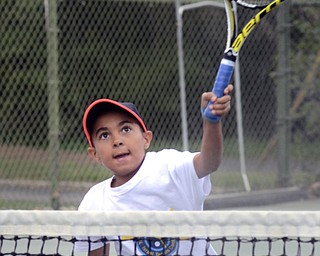 Katie Rickman | The Vindicator. Loui Mussa 10 from Beit Safafa hits a tennis ball during the Israeli Tennis Center exhibition at Youngstown Country Club August 24, 2015.