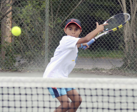 Katie Rickman | The Vindicator. Loui Mussa 10 from Beit Safafa hits a tennis ball during the Israeli Tennis Center exhibition at Youngstown Country Club August 24, 2015.