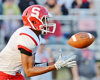 Jeff Lange | The Vindicator  AUGUST 28, 2015 - Takale Rushton of Struthers looks to catch a pass which he ran for a touchdown in the first quarter to make the score 6-0 over Liberty, Friday night in Liberty.