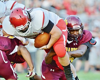 Jeff Lange | The Vindicator  AUGUST 28, 2015 - Leopards' Gariyon Dailey (right) tackles Struthers' Anthony Milone (left) just short of the goal line on a two point conversion attempt in the first quarter of their game, Friday night in Liberty.