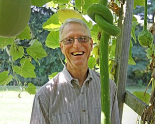        ROBERT K. YOSAY  | THE VINDICATOR..an early KNOTTED gourd he tied himself while growing !..19th and final garden tour at Rodney and Kay TothÕs. they have spectacular display and unique gardens including a gourd tunnel and dahlias, which he is known for ..