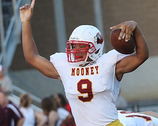       .         ROBERT  K. YOSAY | THE VINDICATOR..David McDowell Celebrates the FIRST TD scred in Boardmans Stadium after a 12 yard sprint  in the first quarter..Boardman Spartan New Stadium as Cardinal Mooney  ..-30-