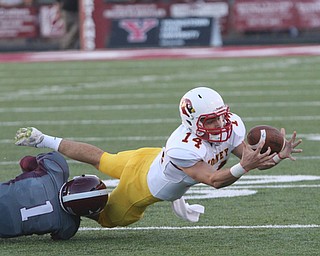       .         ROBERT  K. YOSAY | THE VINDICATOR..Mooneys #14 Jack Lynch recovers his own fumble as Boardmans #1 Koby Adu-Pku  tackles him..Boardman Spartan New Stadium as Cardinal Mooney  ..-30-
