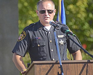 Katie Rickman | The Vindicator.Jim Davis an Austintown Township Trustee speaks about his memories of September 11, 2001 during the Mahoning Valley 9-11 Memorial Ceremony commemorating the 14th anniversary of the attacks.