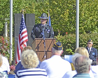Katie Rickman | The Vindicator.Sgt. Jeffrey S. Green of the Ohio State Patrol addresses attendees of the Mahoning Valley 9-11 Memorial Ceremony at the 9-11 Memorial Park on Raccoon Road on September 11, 2015.