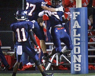 William D. Lewis The Vindicator  Fitch's Carlos Herriott(5) celbrates with Darrell Jackson(11) and Zach Krohn(27) after scoring on a 2nd qtr interception during 9-11 action with Louisville at Fitch.