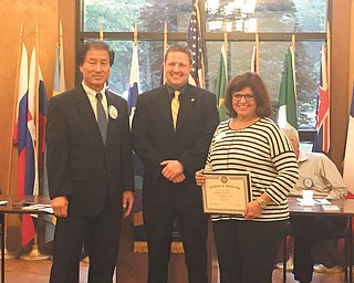 SPECIAL TO THE VINDICATOR
Boardman Rotary recently initiated new member Karen Delisio, a health care administrator at the Commons at Greenbriar in Boardman. She was sponsored by Rotarian Moon Park. Boardman Rotary was established in 1955, and is comprised of 90 area business leaders who use their time, talent and energy to benefit local causes and Rotary International projects. Park, left, membership chair Matt Parks, and Delisio are shown at the initiation ceremony. 