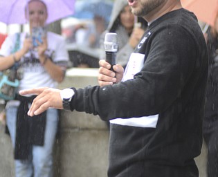 Katie Rickman | The Vindicator.Travis Vancel of Hubbard speaks during the Walk Against Heroin which started at CCA at 1806 Market St and ended at the court house downtown on September 12, 2015.