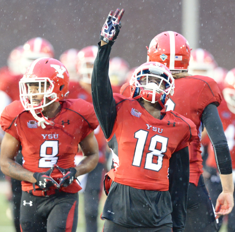 Jeff Lange | The Vindicator  SEPTEMBER 12, 2015 - YSU's DJ Thomas runs onto the field prior to Saturday evening's game against RMU at Stambaugh Stadium..