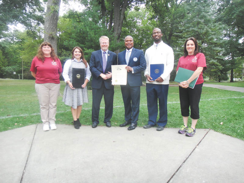 SPECIAL TO THE VINDICATOR
Members of McDonald Girl Scout Troop 80344 received the President’s Award for community service as recognition of the group’s 2,866 hours of service in 2014. Local, state and national politicians recently presented the award to troop officials. Troop leader Candace Ward, left, was joined by state Sen. Capri Cafaro of Liberty, D-32; state Rep. Sean O’Brien of Bazetta, D-63rd; Glenn Holmes, mayor of McDonald; Mark Callion of the office of U.S. Rep. Tim Ryan of Howland, D-13th; and Lori Gillespie, assistant troop leader, to celebrate the honor.