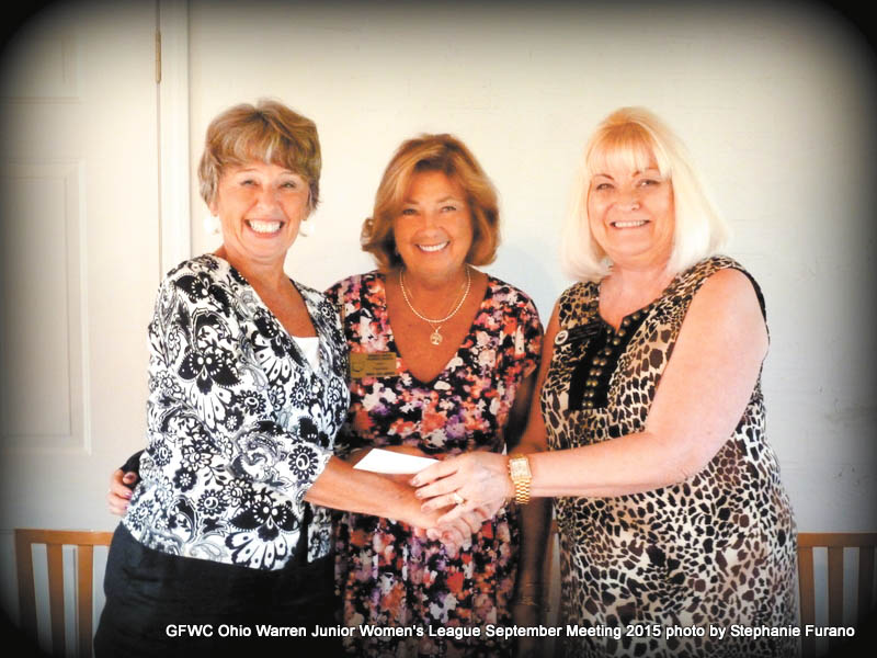 SPECIAL TO THE VINDICATOR
GFWC Ohio Warren Junior Women’s League recently gathered for a September meeting at the Hidden Cafe in Howland. Guests included Ginny Pasha of the United Way of Trumbull County, who discussed the WJWL and United Way’s partnership on a Reading 4 Fun program. It is part of the United Way’s Reading Great by 8 Literacy Initiative, designed to increase the number of Trumbull County children reading at grade level by grade three. Pasha said that about  100 second-grade students will receive a Reading 4 Fun backpack in October, filled with three books, craft materials and a snack. Above are Pasha, left; Mary Lou Jarrett, WJWL president; and Esther Gartland, WJWL second vice president, who presented Pasha with a check for Reading 4 Fun on behalf of the league. Chris Pacileo of the American Heart Association also was a guest at the meeting. He urged league members to join the Tri-County Heart Walk on Sept. 19 at Youngstown State University. Below are Jarrett, left; Pacileo; and Julie Vugrinovich, WJWL home life co-chairman. 