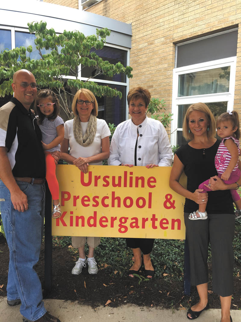SPECIAL TO THE VINDICATOR
Ursuline Preschool and Kindergarten hosted a Meet and Greet event Aug. 27, and staff officials celebrated a teaching connection spanning generations. David and Allison Price attended the event with their daughters, Gabrielle and Nadia, who will attend the school’s program for 3-year-olds and Time for Two class, respectively. David Price shared memories with Ursuline officials Mrs. Critell and Mrs. Gilson, his former first- and second-grade teachers, respectively, at St. Edward’s Elementary School in Youngstown in the 1980s. Critell is current principal/director and Gilson is a kindergarten teacher at UPK. Shown at the event are David Price, left, Gabrielle Price, Gilson, Critell, Allison Price and Nadia Price.