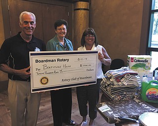 SPECIAL TO THE VINDICATOR
Members of Boardman Rotary recently donated more than $1,000 in needed office and household supplies and a check for $1,200 to benefit the Beatitude House and its residents. Boardman Rotary president Terry Datrile, left, and Rotary community director Shelly LaBerto, right, presented the donations to Beatitude House executive director Sister Janet Gardner.
