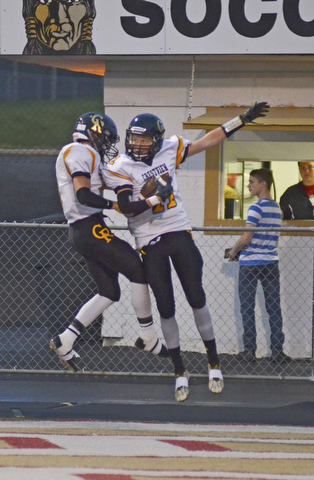 Katie Rickman | The Vindicator.Crestview's Caleb Hill (#11) on right celebrates with Tyler Fitzsimmons(#8) after scoring during the first half of the game against Warren JFK in Warren on Saturday, September 19, 2015.