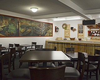 Katie Rickman | The Vindicator.Tables are available for customers who want to stay a while to eat the homemade foods from The Italian Marketplace's deli or have a gift basket custom-made. 