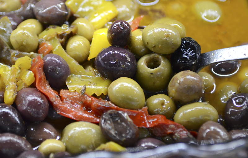 Katie Rickman | The Vindicator.Olives and peppers in olive oil is one of the many fresh foods available at The Italian Marketplace on U.S. Route 422 in NIles.