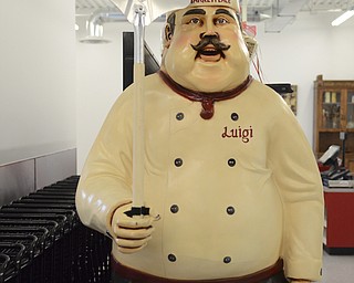 Katie Rickman | The Vindicator.Although the store is newly opened, owners Bobby and Pam Allegretto DeVicchio say many visitors have stopped to take pictures with "Luigi," who greets customers at the front door of The Italian Marketplace.