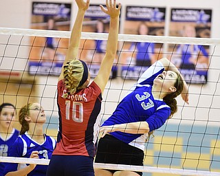 CORTLAND, OHIO - SEPTEMBER 29, 2015: Addie Becker #33 of Lakeview prepares to trike the volleyball while Sarah Obradovich #10 of Fitch goes for the block during their game Tuesday night at Lakeview High School. DAVID DERMER | THE VINDICATOR