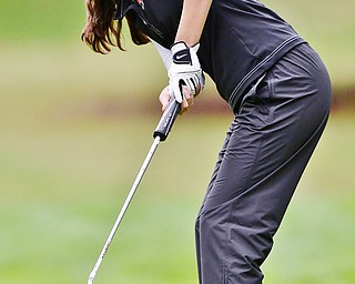 Jeff Lange | The Vindicator  SEPTEMBER 30, 2015 - Cardinal Mooney's Hadley Spielvogel watches her putt to the No. 18 hole during Wednesday's girls sectional golf tournament held at Pine Lakes Golf Club in Hubbard.