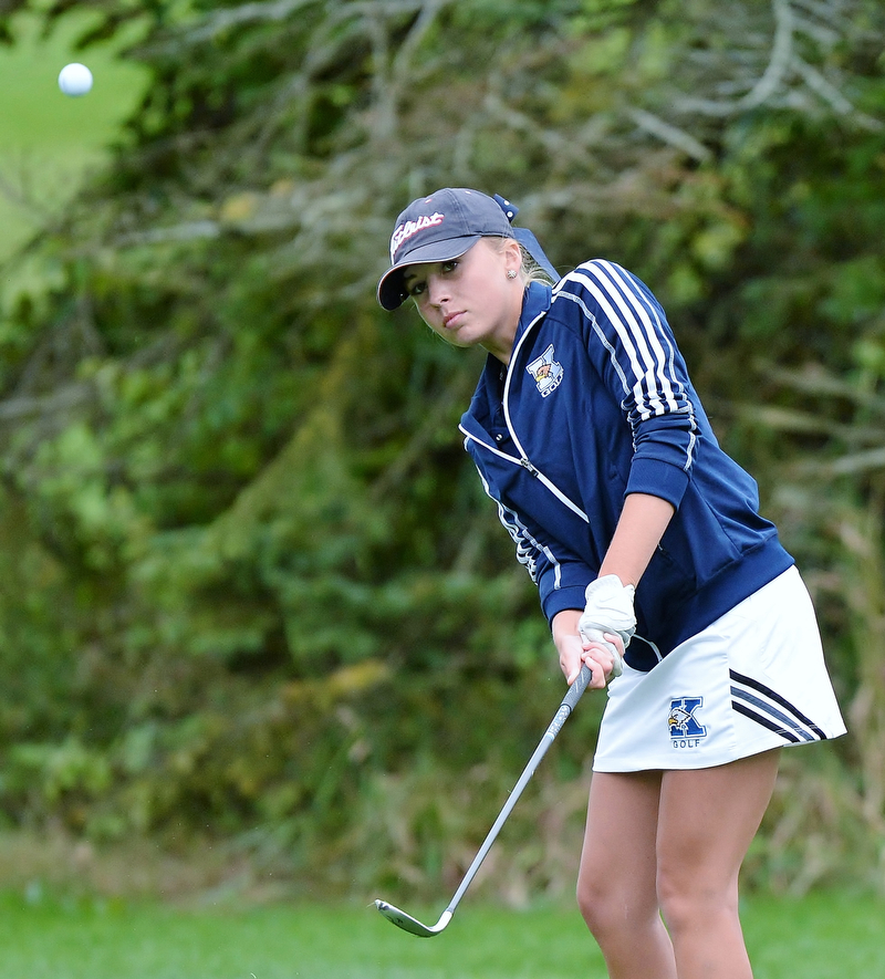Jeff Lange | The Vindicator  SEPTEMBER 30, 2015 - Warren JFK senior Taylor Vassis watches her chip onto the green during Wednesday's girls sectional tournament held at Pine Lakes Golf Club in Hubbard.