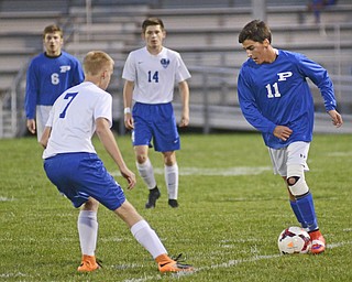 Katie Rickman | The Vindicator.Poland's Trey Medvec (#11) is blocked by Lakeview's  Zac White(#7) during the first half of the game at Lakeview High School on October 1, 2015.