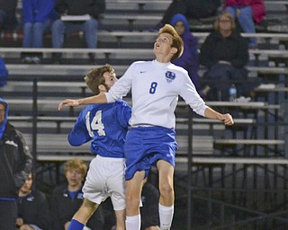 Katie Rickman | The Vindicator.Lakeview's  Brendan White (#8) and Poland's  Matthew Holsinger (#14) compete for the ball during the first half of the game at Lakeview High School on October 1, 2015.