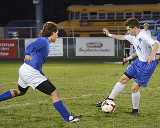 Katie Rickman | The Vindicator.Lakeview's Blake Gill (#14) and Poland's Jake Buccieri(#21) face off during the first half of the game at Lakeview High School on October 1, 2015.