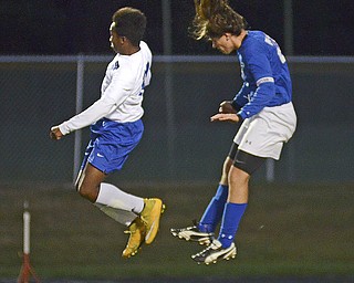 Katie Rickman | The Vindicator.Lakeview's Daniel Golar (#13) and Poland's Jake Buccieri  (#21) compete for the ball during the first half of the game at Lakeview High School on October 1, 2015.