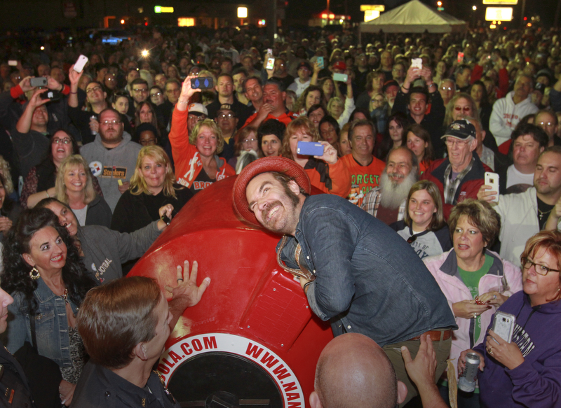 William D Lewis The Vindicator Crowd of nearly 4,000 on hand for Queen of Hearts drawing Barry Dyngles 10-4-15. Scott Terry, lead singer of Red Wanting Blue drew winning ticket.