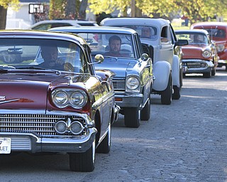 Wiliam d Lewis the vindicator Dennis Hake is all smiles as he and his wife Dolly watch a parade of classic cars passing their Howland home 10-11-15. Hake , a car enthusiast is suffering form serious illnes and his wish was to see a car show.