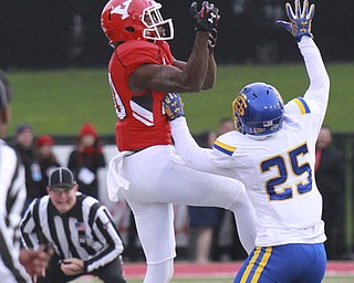 William d Lewis the vindicator  YSU Andrew Williams(80) bobbles a pass while SDS Clark Wiencke(25 defends.