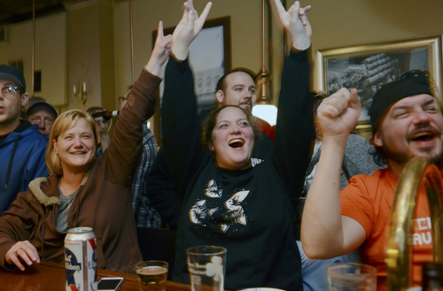 Katie Rickman | The Vindicator.Royal Oak was packed with excited locals to catch a glimpse of the premiere of Bar Rescue, from left, Marilyn McClung of Hubbard, Sarah Yaple of Youngstown and Martin Hudak of Youngstown react as they watch the show from the bar Sunday evening.